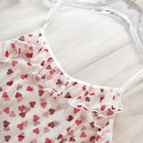 Conjunto de pijama sexy con estampado de corazones, parte superior estilo camisola con volantes y pantalones cortos de doble capa