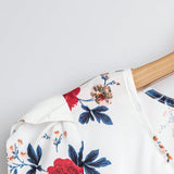 Blusa estampada floral en a grande con mangas de petalos