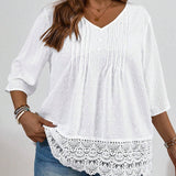 Blusa con paneles de encaje de guipur suizo en as grandes