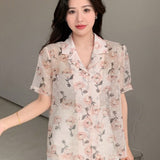 Blusa para mujer de manga corta con botones y cuello con solapa con estampado floral