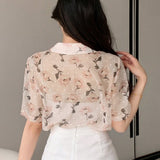 Blusa para mujer de manga corta con botones y cuello con solapa con estampado floral