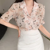 Blusa para mujer de manga corta con botones y cuello con solapa con estampado floral