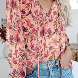 Blusa con estampado floral con cuello de lazo y mangas con vuelo