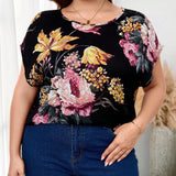 Clasi Blusa de a grande con estampado floral y mangas murcielago