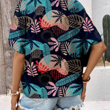 Blusa de manga murcielago con estampado tropical