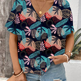 Blusa de manga murcielago con estampado tropical