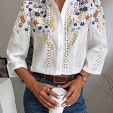 Camisa floral bordada con botones en la parte delantera