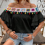 Blusa de hombros descubiertos con borlas en el borde