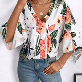 Blusa de manga murcielago con estampado tropical para el verano