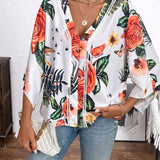 Blusa de manga murcielago con estampado tropical para el verano