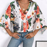 Blusa de manga murcielago con estampado tropical para el verano