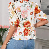 Blusa de cuello redondo con mangas gigot y textura de patron floral de tela