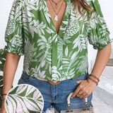 Blusa con estampado tropical y mangas abullonadas en a grande