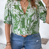 Blusa con estampado tropical y mangas abullonadas en a grande