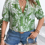 Blusa con estampado tropical y mangas abullonadas en a grande