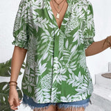 Blusa con estampado tropical y mangas abullonadas en a grande