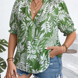 Blusa con estampado tropical y mangas abullonadas en a grande