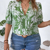 Blusa con estampado tropical y mangas abullonadas en a grande