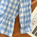 Camisa de cuadros con cuello redondo y manga larga, lazo frontal, dees de encaje y pliegues de fruncido, perfecta para la temporada de graduacion