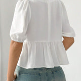 Blusa de mujer de unicolor con cuello redondo, dees de huecos, dobladillo con volantes y decoracion de lazo