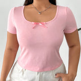 Camiseta rosa de manga corta y corte ajustado para mujer de a grande