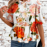 Blusa de cuello redondo con mangas gigot y textura de patron floral de tela