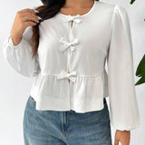 Blusa de mujer a grande de primavera y verano con cuello redondo, manga farol, decoracion de lazo y dobladillo con volantes