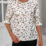 Camisa elegante informal de mujer con estampado de leopardo, diseno de lazo en la espalda y mangas por la mitad