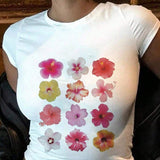 Camiseta de verano para mujeres de a grande con estampado floral, ajuste delgado, cuello redondo y mangas cortas casuales