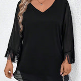 Blusa informal de a grande, de cuello en V, de longitud media, con flecos