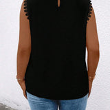 Blusa de cuello alto con encaje Guipure y a grande