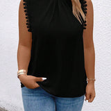 Blusa de cuello alto con encaje Guipure y a grande