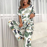 Conjunto de pijama pantalones con camiseta con estampado tropical