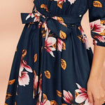 Vestido con cinturón con estampado floral