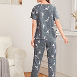 Conjunto de pijama con estampado de delfin con mascara de ojo 3 piezas