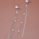 Pendientes largos con diseno de perla artificial con fleco