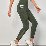 Yoga Trendy Leggings de yoga, mallas deportivas con cintura ancha y malla en contraste con control de barriga y bolsillo para telefono