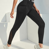 Yoga High Street Leggings deportivos con patron de letra cinta panel con malla con bolsillo de celular