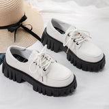 Zapatos de plataforma Oxford negros con cordones minimalistas para mujer