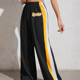 Coolane Pantalones con estampado de letra con costura lateral en contraste