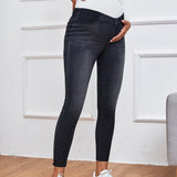 Maternidad Jeans ajustados de cintura ancha bajo crudo