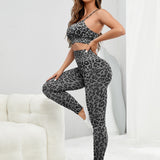 Yoga Trendy 2 piezas Traje de yoga fitness con estampado de leopardo de canale traje de entrenamiento Cami con tira cruzada con Leggings con control de barriga