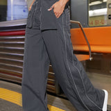 Pantalones cargo de pernera ancha con detalle de cremallera y bolsillo inclinado de Street