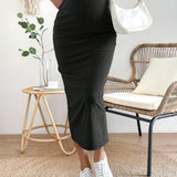 Maternidad Falda de cintura ajustable tejido de canale con abertura trasera