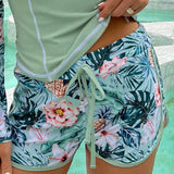 Shorts bikini con estampado tropical