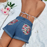 VCAY Shorts en mezclilla con estampado floral bajo de doblez
