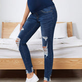 Maternidad Jeans ajustados de talle alto con diseno de desgarro