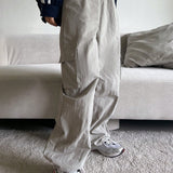 DAZY Pantalones cargo unicolor bajo con cordon con bolsillo lateral con solapa