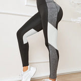 Yoga Future Leggings deportivos de color combinado de cintura ancha con bolsillo para telefono