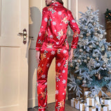 Conjunto de pijama de saten con ribetes en contraste y estampado navideno